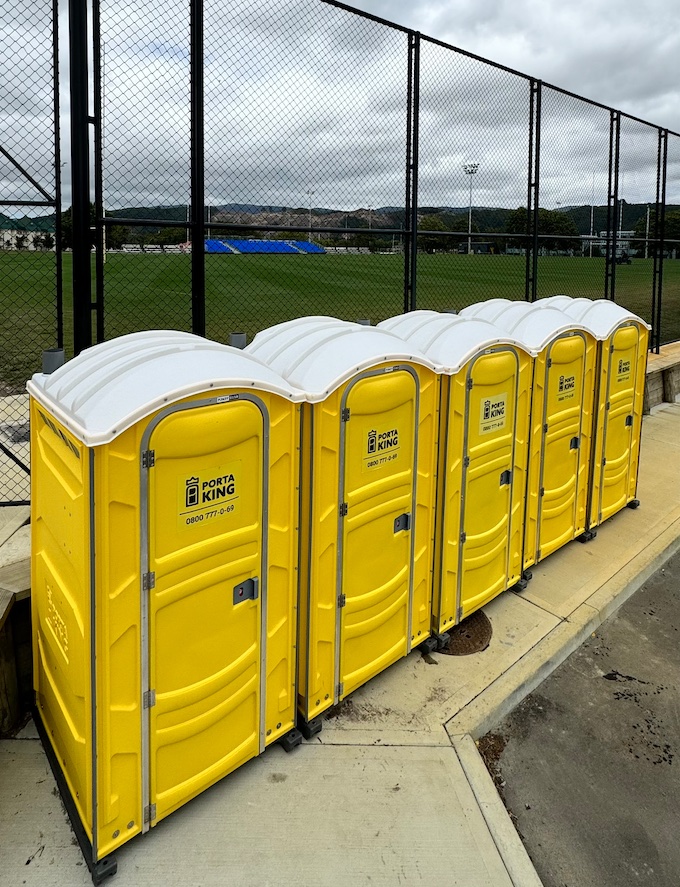 A row of Porta King units at a Wellington sports ground